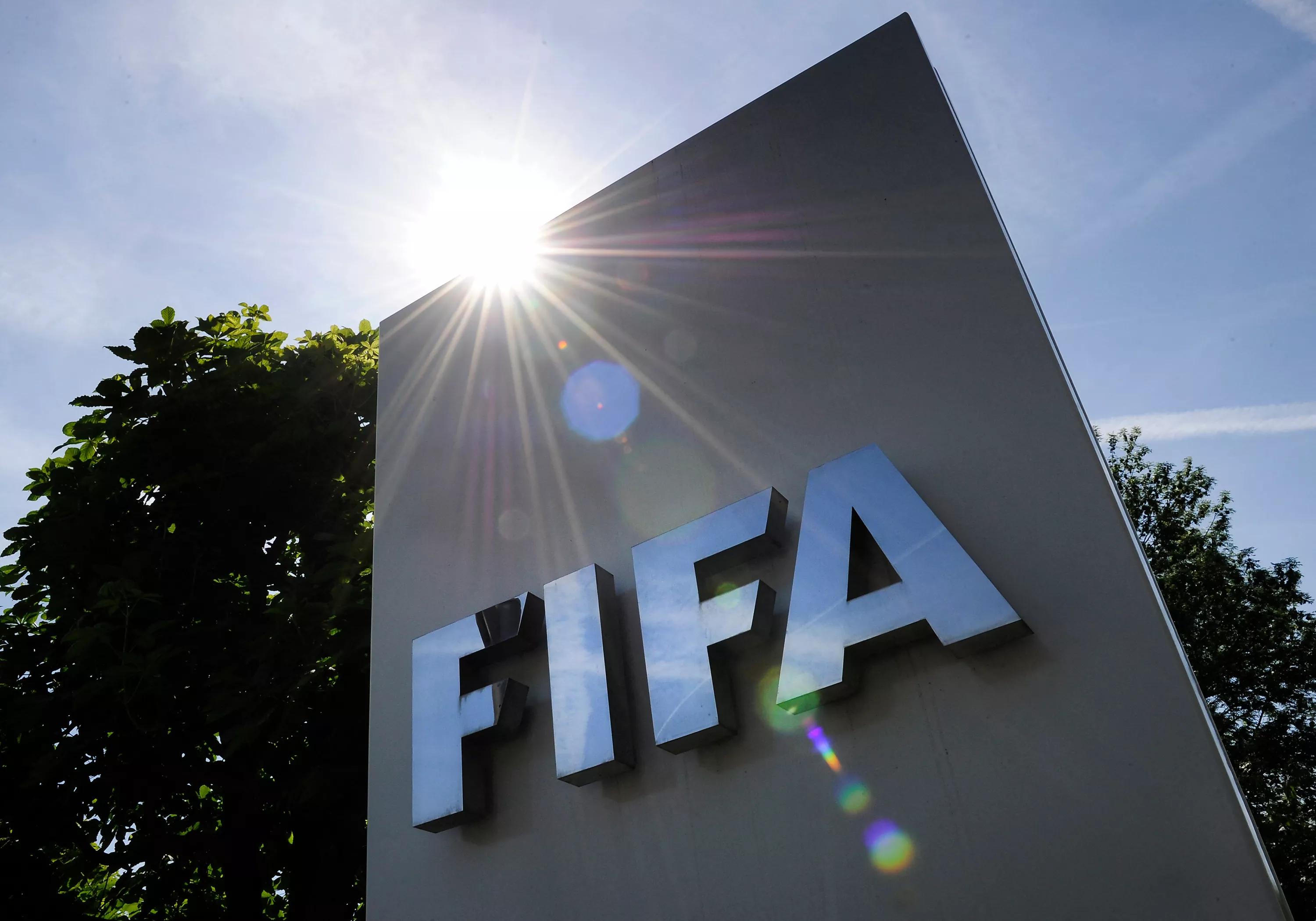 A picture shows the sign of the football's world governing body FIFA at the entrance of its headquarters on May 29, 2011 in Zurich. AFP PHOTO / FABRICE COFFRINI (Photo by Fabrice COFFRINI / AFP) (Photo by FABRICE COFFRINI/AFP via Getty Images)